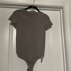 Skims thong bodysuit, raw edge